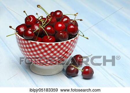 Stock Photo - Cherry in bowl, Sweet,, Sweet, stone fruit, stone fruit. Fotosearch
