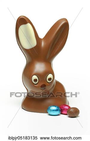 Stock Photography - Chocolate Easter bunny and chocolate eggs, Easter bunny. Fotosearch