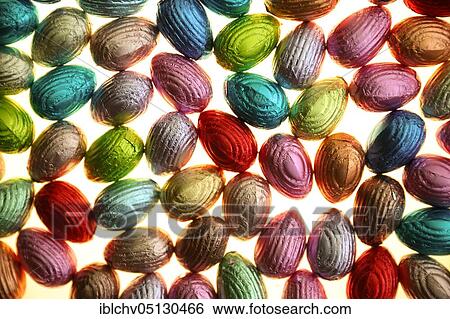 Chocolate eggs in stores before Easter, Belgium, Europe View Large Photo Image Stock Photograph - Chocolate eggs in stores before Easter, Belgium, Europe. Fotosearch