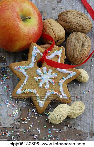 Christmas cookies, walnuts, peanuts and apple View Large Photo Image Stock Photography - Christmas cookies, walnuts, peanuts and apple. Fotosearch