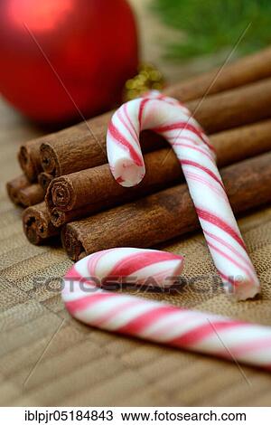 Cinnamon ( Cinnamomum) candy canes and candy sticks with christmas decoration, rod spec View Large Photo Image Stock Image - Cinnamon ( Cinnamomum) candy canes and candy sticks with christmas decoration, rod spec. Fotosearch