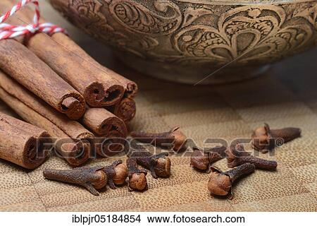 Picture - Cinnamon sticks and cloves, cinnamon, cinnamon stick ( Syzygium aromaticum ( Cinnamomum) spec. ). Fotosearch