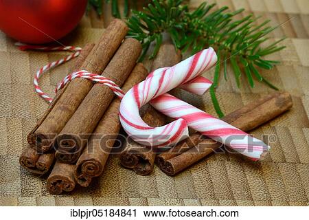 Stock Image - Cinnamonsticks and star anise with Christmas decoration, stick, star anise, aniseed. Fotosearch