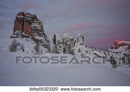 Stock Image - Cinque Torri, five towers, Alpenglow, Dolomites, South Tyrol, Italy, Europe. Fotosearch