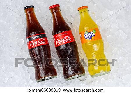 Coca Cola Coca-Cola products Fanta Sprite lemonade soft drink drinks bottle ice cube ice cubes in Germany View Large Photo Image Stock Photo - Coca Cola Coca-Cola products Fanta Sprite lemonade soft drink drinks bottle ice cube ice cubes in Germany. Fotosearch