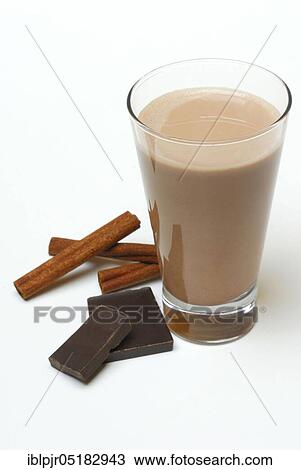 Cocoa, glass of drinking chocolate with straw, cocoa drink, dairy products, chocolate, chocolate pieces, cinnamon sticks, cinnamon View Large Photo Image Stock Image - Cocoa, glass of drinking chocolate with straw, cocoa drink, dairy products, chocolate, chocolate pieces, cinnamon sticks, cinnamon. Fotosearch