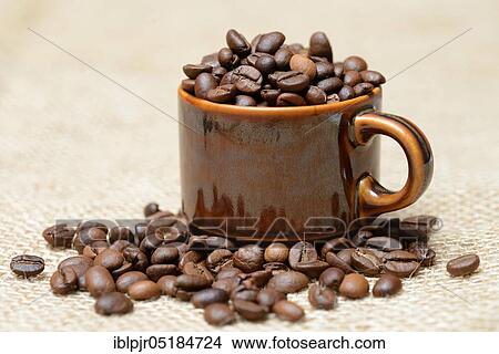 Coffee beans in a cup View Large Photo Image Picture - Coffee beans in a cup. Fotosearch