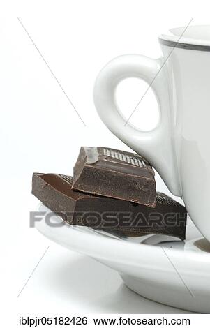 Coffee cup and dark chocolate, chocolate pieces, coffee View Large Photo Image Stock Photograph - Coffee cup and dark chocolate, chocolate pieces, coffee. Fotosearch