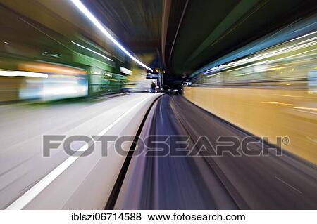 Colorful, semi-abstract light traces from a moving suspension railway in the evening, Wuppertal, Bergisches Land, North Rhine-Westphalia, Germany, Europe View Large Photo Image Stock Photo - Colorful, semi-abstract light traces from a moving suspension railway in the evening, Wuppertal, Bergisches Land, North Rhine-Westphalia, Germany, Europe. Fotosearch