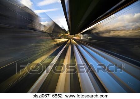 Colourful, semi-abstract traces of movement of a moving suspension railway by long time exposure, Wuppertal, Bergisches Land, North Rhine-Westphalia, Germany, Europe View Large Photo Image Stock Image - Colourful, semi-abstract traces of movement of a moving suspension railway by long time exposure, Wuppertal, Bergisches Land, North Rhine-Westphalia, Germany, Europe. Fotosearch