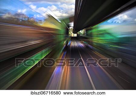 Colourful, semi-abstract traces of movement of a moving suspension railway by long time exposure, Wuppertal, Bergisches Land, North Rhine-Westphalia, Germany, Europe View Large Photo Image Stock Image - Colourful, semi-abstract traces of movement of a moving suspension railway by long time exposure, Wuppertal, Bergisches Land, North Rhine-Westphalia, Germany, Europe. Fotosearch