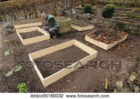 Creating an organic garden, natural garden, box system, compost View Large Photo Image Stock Image - Creating an organic garden, natural garden, box system, compost. Fotosearch