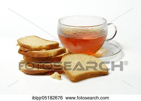 Stock Photograph - Cup rooibos tea and rusk, rooibos tea, rooibos tea, baked goods, tea cup. Fotosearch