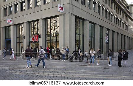 Customers queue up in front of H& M, Click & Meet shopping with QR code, digital contact tracking in retail, Corona crisis, Stuttgart, Baden-Württemberg, Germany, Europe View Large Photo Image Stock Photo - Customers queue up in front of H& M, Click & Meet shopping with QR code, digital contact tracking in retail, Corona crisis, Stuttgart, Baden-Württemberg, Germany, Europe. Fotosearch