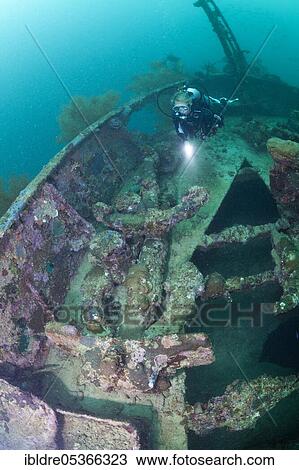 Diver at Japanese Wreck 2, Marovo Lagoon, Solomon Islands, Oceania View Large Photo Image Stock Image - Diver at Japanese Wreck 2, Marovo Lagoon, Solomon Islands, Oceania. Fotosearch