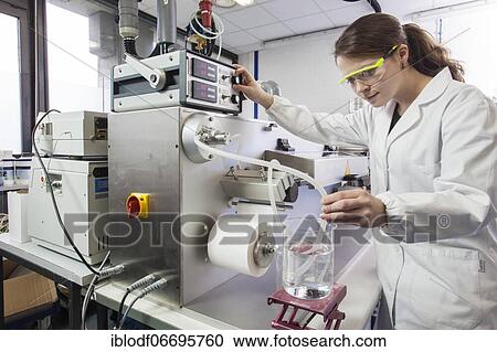 Doctoral student during her research work on a film drawing bench at the Institute for Pharmaceutical Technology and Biopharmacy at Heinrich-Heine-University Düsseldorf, North Rhine-Westphalia, Germany, Europe View Large Photo Image Stock Image - Doctoral student during her research work on a film drawing bench at the Institute for Pharmaceutical Technology and Biopharmacy at Heinrich-Heine-University Düsseldorf, North Rhine-Westphalia, Germany, Europe. Fotosearch