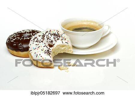 Stock Photo - Donuts and cup of coffee, doughnut, doughnut, doughnuts, baked goods, sugar glaze. Fotosearch