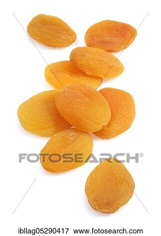 Stock Photo - Dried apricot (Prunus armeniaca), dried fruit against white background. Fotosearch