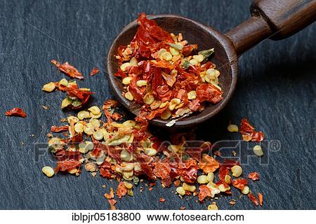 Dried chili peppers with wooden spoon, chili flakes, cayenne, paprika, chili pepper, hot pepper, tabasco, piri-piri View Large Photo Image Stock Image - Dried chili peppers with wooden spoon, chili flakes, cayenne, paprika, chili pepper, hot pepper, tabasco, piri-piri. Fotosearch