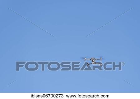Drone flies in front of blue sky, DJI Mavic Pro 2, Germany, Europe View Large Photo Image Stock Image - Drone flies in front of blue sky, DJI Mavic Pro 2, Germany, Europe. Fotosearch