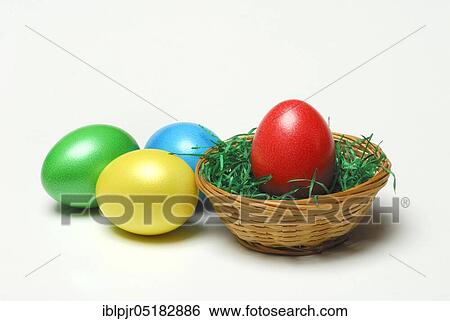 Stock Photograph - Easter eggs, Easter egg, with basket, basket, egg, eggs, Easter, Easter, Easter, hen eggs, tradition, traditional, dyed, painted, basket. Fotosearch