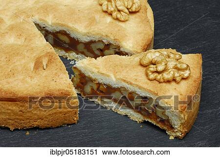 Stock Image - Engadine nut cake, cake, walnut, short pastry with caramel and walnuts. Fotosearch