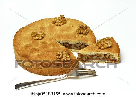 Stock Photography - Engadine nut cake, cake, walnut, short pastry with caramel and walnuts, fork. Fotosearch