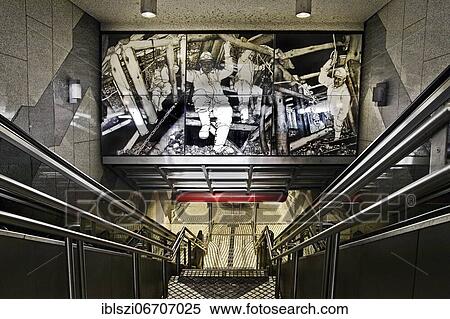 Entrance to the underground station Bergwerk Consolidation with artwork about mining by Alfred Schmidt, Gelsenkirchen, Ruhr Area, North Rhine-Westphalia, Germany, Europe View Large Photo Image Stock Photography - Entrance to the underground station Bergwerk Consolidation with artwork about mining by Alfred Schmidt, Gelsenkirchen, Ruhr Area, North Rhine-Westphalia, Germany, Europe. Fotosearch