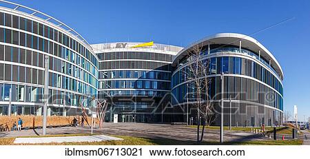 Stock Image - Ernst &amp; Young EY Headquarters in the Skyloop Building Panorama at Stuttgart Airport, Germany, Europe. Fotosearch