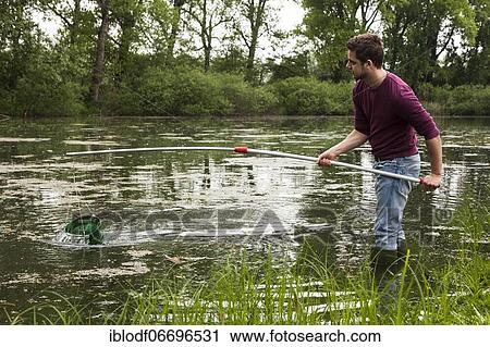 Excursion of the working group for biodiversity takes water samples at the Lower Rhine in old Rhine arms and ponds, Faculty of Biology, University of Duisburg-Essen, Location: Grietherbusch, North Rhine-Westphalia, Germany, Europe View Large Photo Image Stock Image - Excursion of the working group for biodiversity takes water samples at the Lower Rhine in old Rhine arms and ponds, Faculty of Biology, University of Duisburg-Essen, Location: Grietherbusch, North Rhine-Westphalia, Germany, Europe. Fotosearch