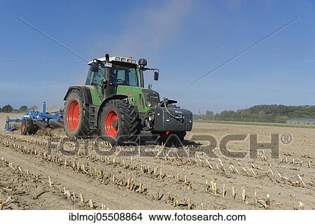 Farmer cultivating harvested maize field, Nettetal, Viersen, NRW, Germany, Europe View Large Photo Image Picture - Farmer cultivating harvested maize field, Nettetal, Viersen, NRW, Germany, Europe. Fotosearch