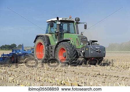 Farmer cultivating harvested maize field, Nettetal, Viersen, NRW, Germany, Europe View Large Photo Image Stock Photo - Farmer cultivating harvested maize field, Nettetal, Viersen, NRW, Germany, Europe. Fotosearch