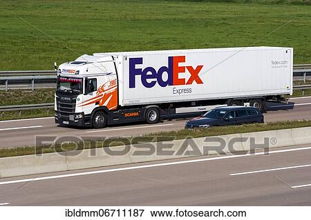 Stock Photo - FedEx truck driving on the A8 motorway near Jettingen, Bavaria, Germany, Europe. Fotosearch