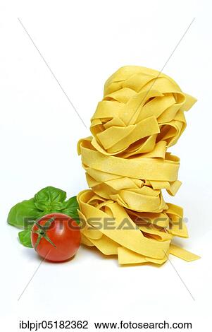 Fettucine dyed with saffron, with tomato and basil, noodles, pasta, ribbon noodles View Large Photo Image Stock Image - Fettucine dyed with saffron, with tomato and basil, noodles, pasta, ribbon noodles. Fotosearch
