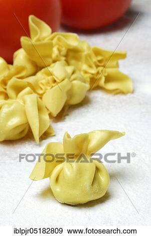 Stock Photo - Filled pastry beads, pearl al basilico, pasta, pasta, pastry beads. Fotosearch