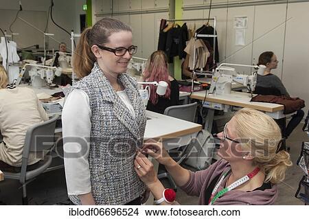 Picture - Fitting in the textile class, training as a tailor, Elly-Heuss-Knapp-Schule, Berufskolleg der Stadt Düsseldorf, North Rhine-Westphalia, Germany, Europe. Fotosearch