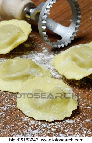 Fresh ravioli with ravioli cutter, pasta, cookie cutter View Large Photo Image Stock Image - Fresh ravioli with ravioli cutter, pasta, cookie cutter. Fotosearch