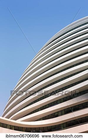 Stock Photograph - Galaxy SOHO Shopping Mall in Beijing, China, Asia. Fotosearch