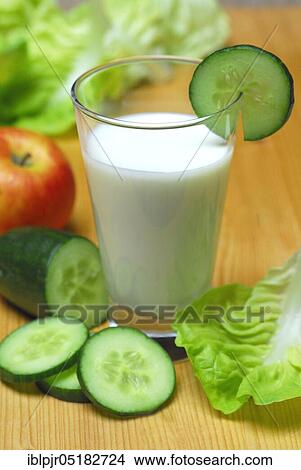 Glass of buttermilk, cucumber, lettuce leaf and apple, milk, lettuce, lettuce, cucumber View Large Photo Image Picture - Glass of buttermilk, cucumber, lettuce leaf and apple, milk, lettuce, lettuce, cucumber. Fotosearch
