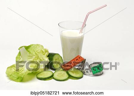 Glass of buttermilk, cucumber, lettuce leaf, milk, straw, lettuce, lettuce, cucumber, measuring tape View Large Photo Image Stock Image - Glass of buttermilk, cucumber, lettuce leaf, milk, straw, lettuce, lettuce, cucumber, measuring tape. Fotosearch