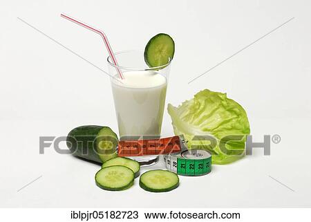 Glass of buttermilk, cucumber, lettuce leaf, milk, straw, lettuce, lettuce, cucumber, measuring tape View Large Photo Image Stock Image - Glass of buttermilk, cucumber, lettuce leaf, milk, straw, lettuce, lettuce, cucumber, measuring tape. Fotosearch