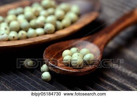 Green pepper in wooden spoon, peppercorn, peppercorns View Large Photo Image Stock Image - Green pepper in wooden spoon, peppercorn, peppercorns. Fotosearch
