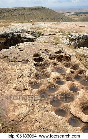 Göbekli Tepi, near Sanliurfa, Southeast Anatolia, excavations, excavation site, finding place, prehistoric, archaeology, Mesopotamia, Stone Age, Stone Age mountain sanctuary,..., cistern like depressions, view in Harran plain, Turkey, Asia View Large Photo Image Picture - Göbekli Tepi, near Sanliurfa, Southeast Anatolia, excavations, excavation site, finding place, prehistoric, archaeology, Mesopotamia, Stone Age, Stone Age mountain sanctuary,..., cistern like depressions, view in Harran plain, Turkey, Asia. Fotosearch