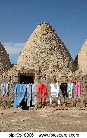 Harran, mud brick, mud house, clothesline, traditional beehive shaped mud houses, trulli, Sanliurfa Province, Mesopotamia, Turkey, Asia View Large Photo Image Stock Image - Harran, mud brick, mud house, clothesline, traditional beehive shaped mud houses, trulli, Sanliurfa Province, Mesopotamia, Turkey, Asia. Fotosearch