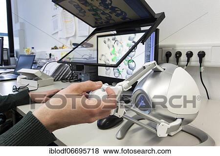 Heinrich-Heine-University, Theoretical Pharmacy Group Prof. Gohlke, PhD student at 3D monitor with 3D mouse, Düsseldorf, Germany, Europe View Large Photo Image Stock Photo - Heinrich-Heine-University, Theoretical Pharmacy Group Prof. Gohlke, PhD student at 3D monitor with 3D mouse, Düsseldorf, Germany, Europe. Fotosearch