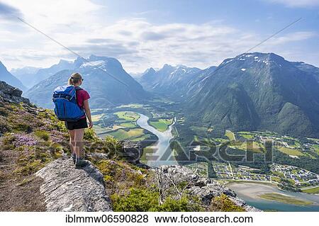Hiker on the Romsdalseggen hike, mountain ridge, Rauma River, Romsdalfjellene Mountains, Andalsnes, Møre og Romsdal, Norway, Europe View Large Photo Image Stock Photo - Hiker on the Romsdalseggen hike, mountain ridge, Rauma River, Romsdalfjellene Mountains, Andalsnes, Møre og Romsdal, Norway, Europe. Fotosearch