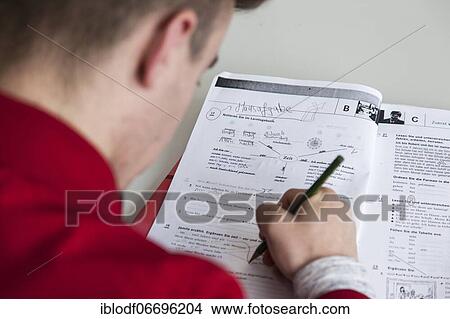 Homework of the refugee class in the Ausbildungsvorbereitung International (AVI) of the Elly-Heuss-Knapp-Schule, a vocational college of the city of Düsseldorf, North Rhine-Westphalia, Germany, Europe View Large Photo Image Picture - Homework of the refugee class in the Ausbildungsvorbereitung International (AVI) of the Elly-Heuss-Knapp-Schule, a vocational college of the city of Düsseldorf, North Rhine-Westphalia, Germany, Europe. Fotosearch