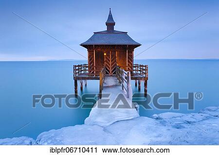 Iced bathhouse at dawn, Lake Neuchâtel, Gorgier, Neuchâtel, Switzerland, Europe View Large Photo Image Stock Image - Iced bathhouse at dawn, Lake Neuchâtel, Gorgier, Neuchâtel, Switzerland, Europe. Fotosearch
