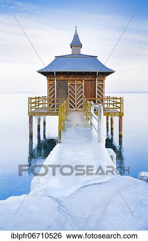 Stock Photograph - Iced bathhouse at dusk, Lake Neuchâtel, Gorgier, Neuchâtel, Switzerland, Europe. Fotosearch
