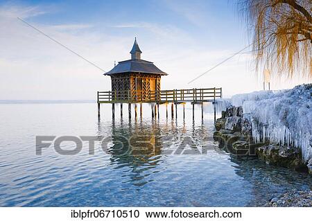 Stock Image - Iced bathhouse, Lake Neuchâtel, Gorgier, Neuchâtel, Switzerland, Europe. Fotosearch
